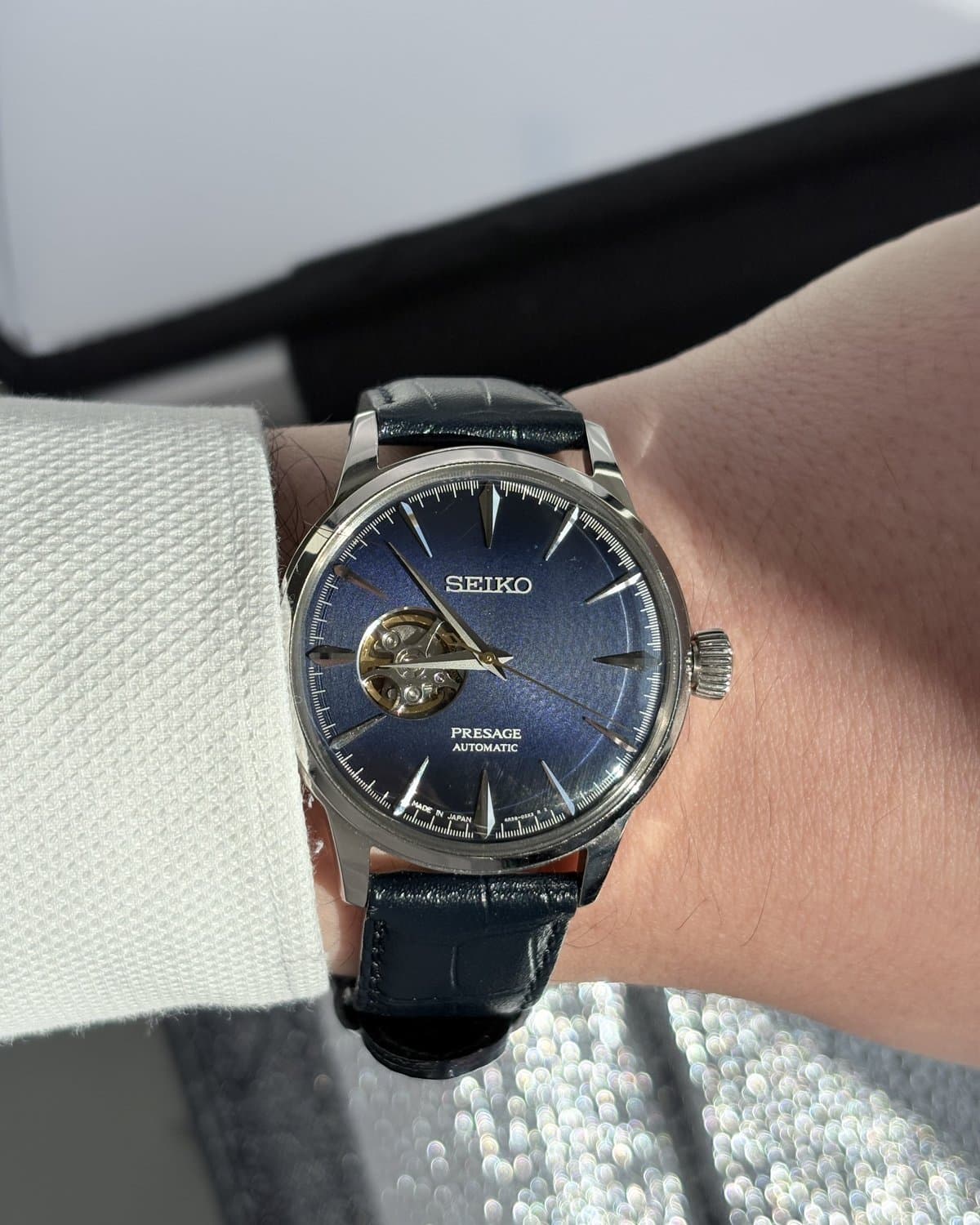 Seiko Presage with blue open-heart dial in sunlight